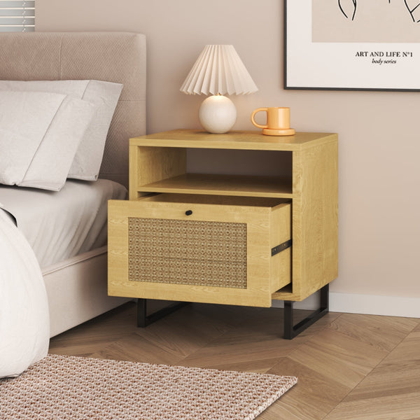 Rattan Lyra Nightstand in a bedroom with natural light