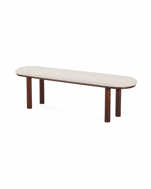 Ella Bench in Almond Cream with Walnut-finish metal legs, three-quarter view showing the rounded seat