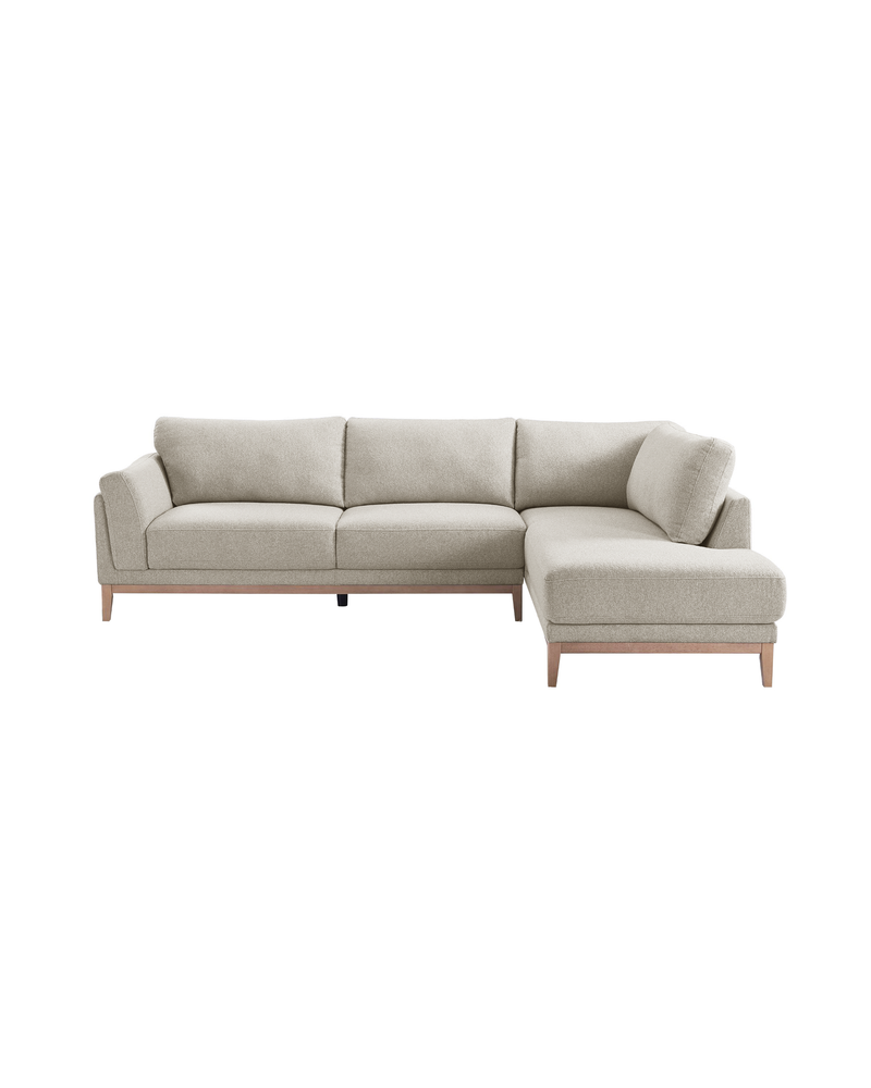 Upholstered Liva Sectional in Natural Dune, right facing, three-quarter view with soft woven fabric