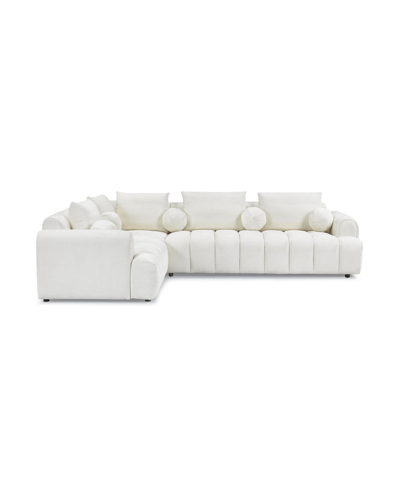 Bouclé Mellow Sectional sectional sofa in Cream Puff, three-quarter view showing seat depth