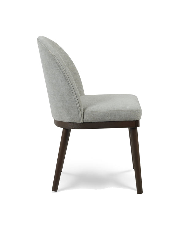 Upholstered Saville Dining Chair in Earl Grey, side profile showing the high arched back