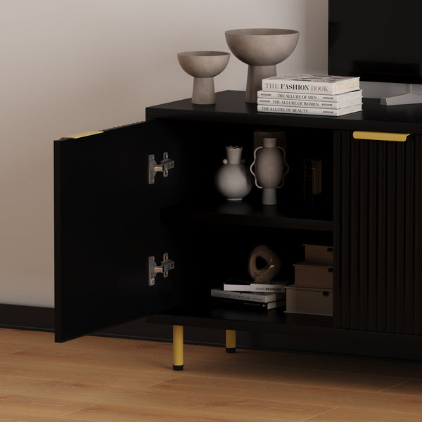 Luna Media Unit in Black styled with a coffee table