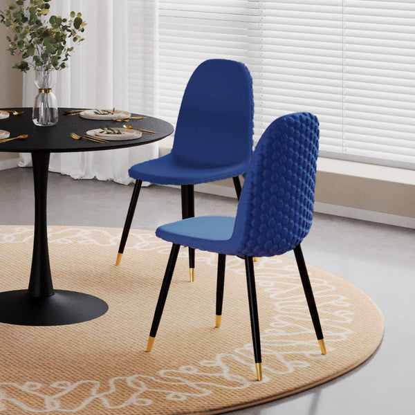Mink Velvet Dining Chair in Blue styled in a dining room
