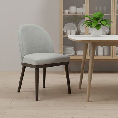 Upholstered Saville Dining Chair styled in a dining room