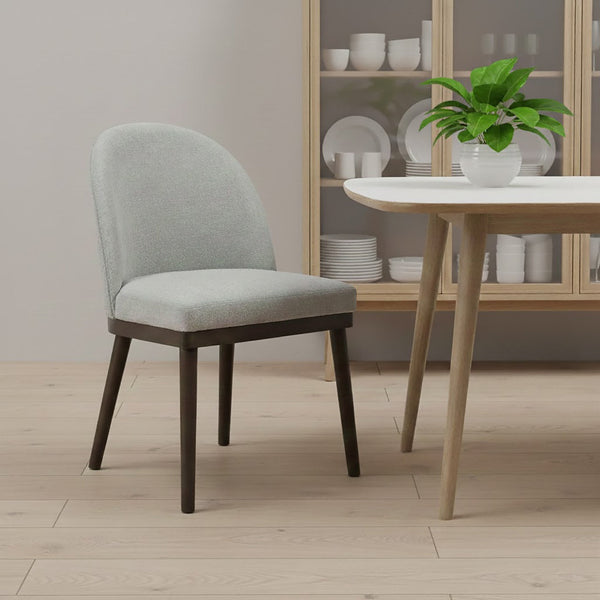 Upholstered Saville Dining Chair styled in a dining room