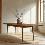 Acacia Solace Extendable Dining Table around a dining table
