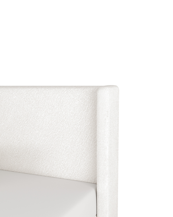 Close-up of the headboard on the Aura Lift Up Storage Bed in Butter Cream