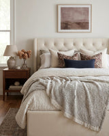 Upholstered Brittany Lift Up Storage Bed styled in a bedroom