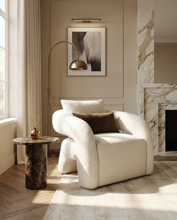 Daisy Armchair in Meringue Bouclé in a living room with natural light