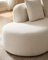 Elaan Sectional sectional sofa in White Chocolate styled with a coffee table