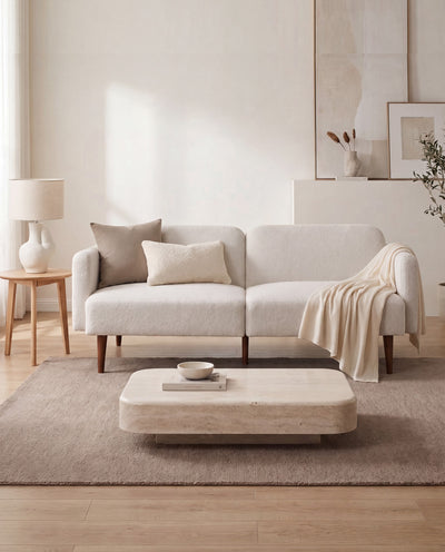 Elin Sofa Bed in Silver Mist styled in a living room