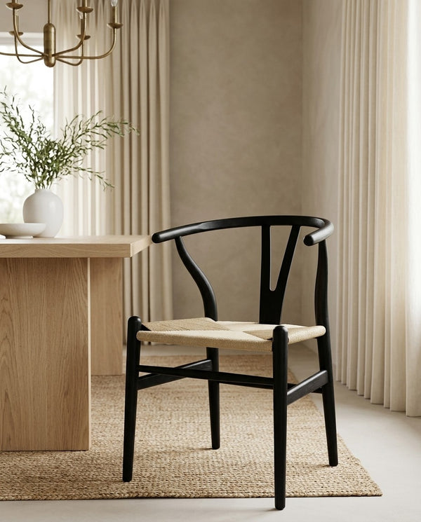 Harlow Dining Chair in Black around a dining table
