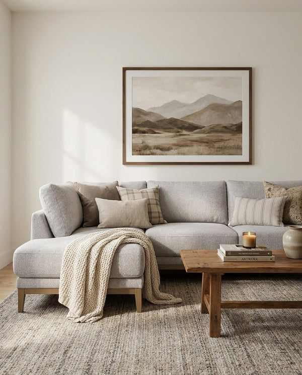 Upholstered Liva Sectional sectional sofa in Truffle Grey in a living room with natural light
