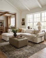 Ollie Sectional left-facing in a living room