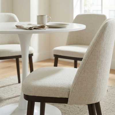 Raya Dining Chair in Cashmere Cream styled in a dining room