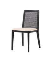 Linen Dario Dining Chair, three-quarter view with woven cane back