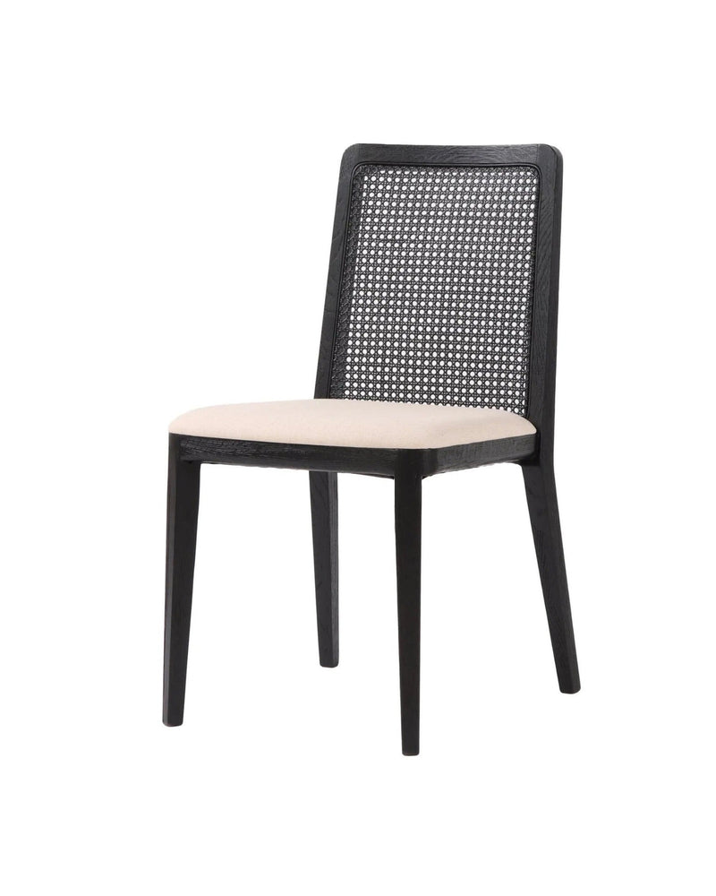 Linen Dario Dining Chair, three-quarter view with woven cane back