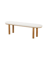 Bouclé Ella Bench with Oak-finish metal legs, three-quarter view showing the rounded seat