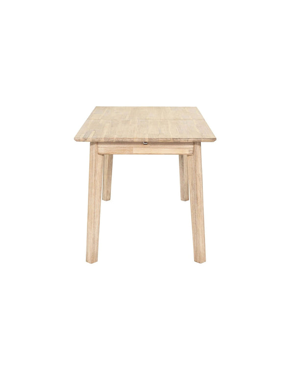 Acacia Homestead Extendable Dining Table, three-quarter view with angled legs