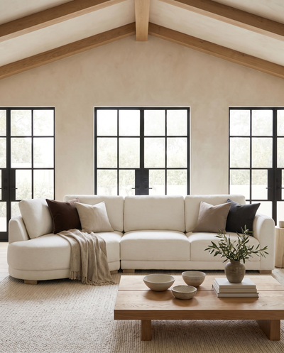 Aykah Juliette Sectional in cream, styled in a living room