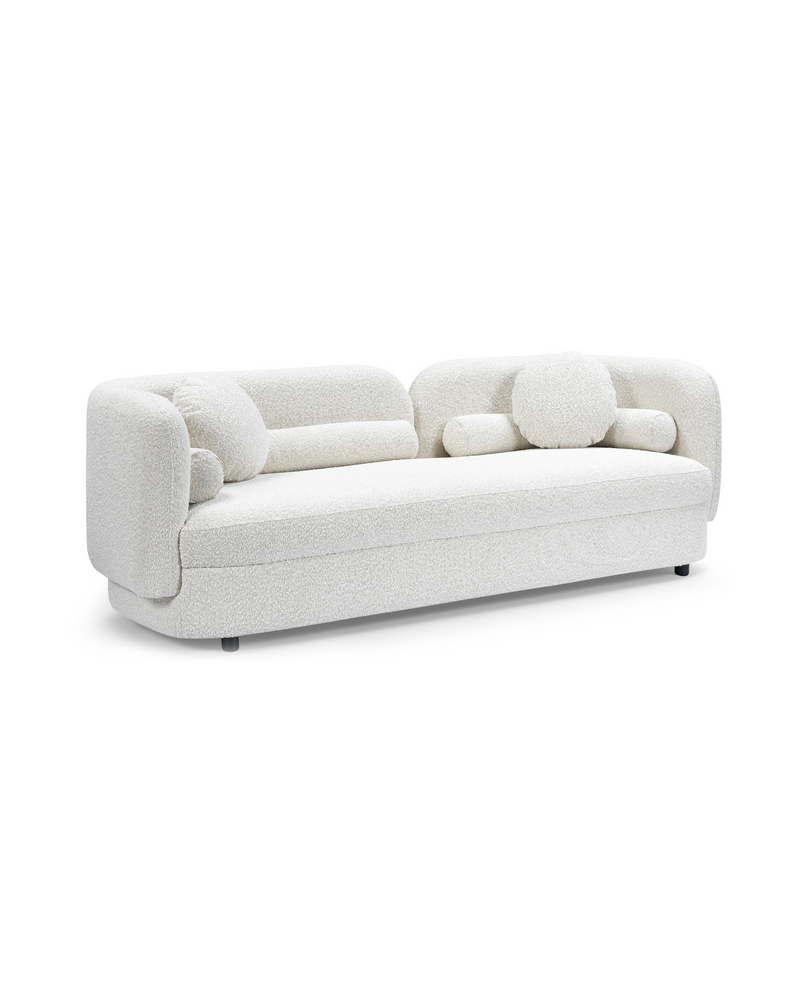 Juniper Sofa in Meringue Bouclé, three-quarter view showing seat depth