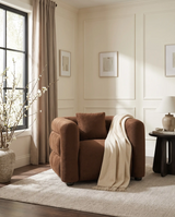 Lillian Armchair in warm espresso, styled in a room