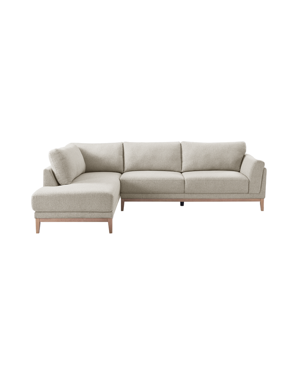 Upholstered Liva Sectional in Natural Dune, left facing, three-quarter view with soft woven fabric