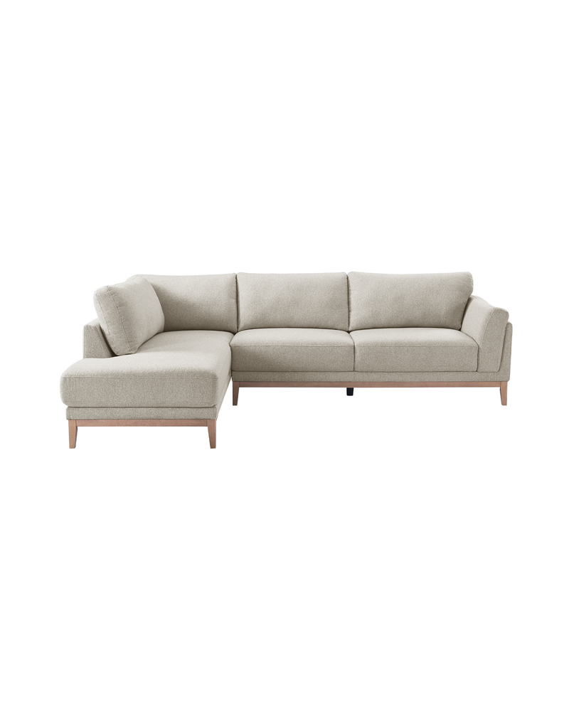Upholstered Liva Sectional in Natural Dune, left facing, three-quarter view with soft woven fabric