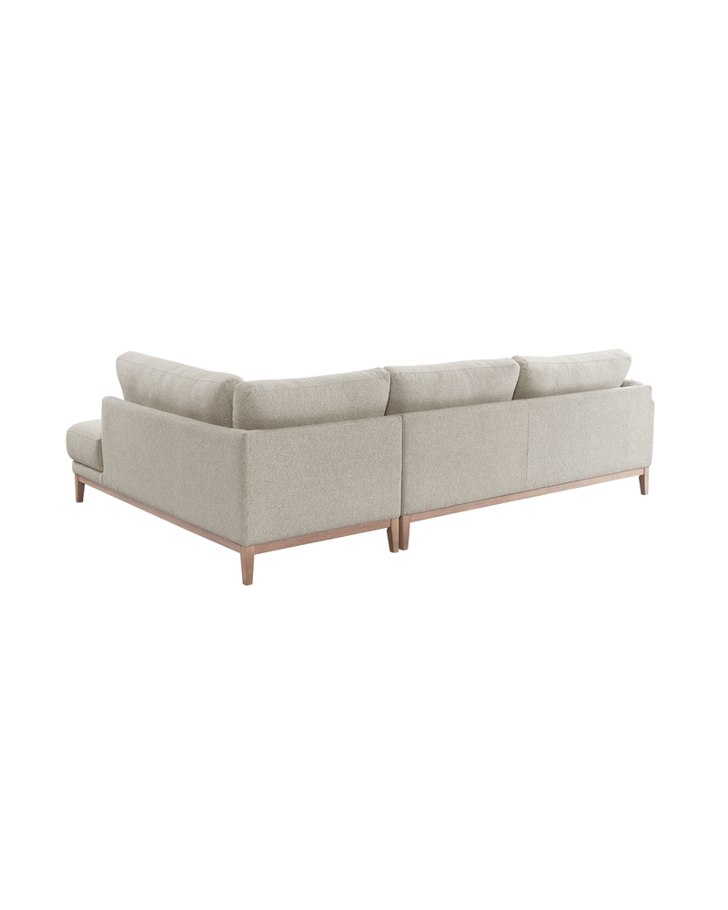Upholstered Liva Sectional in Natural Dune, right facing, back view showing the finished reverse