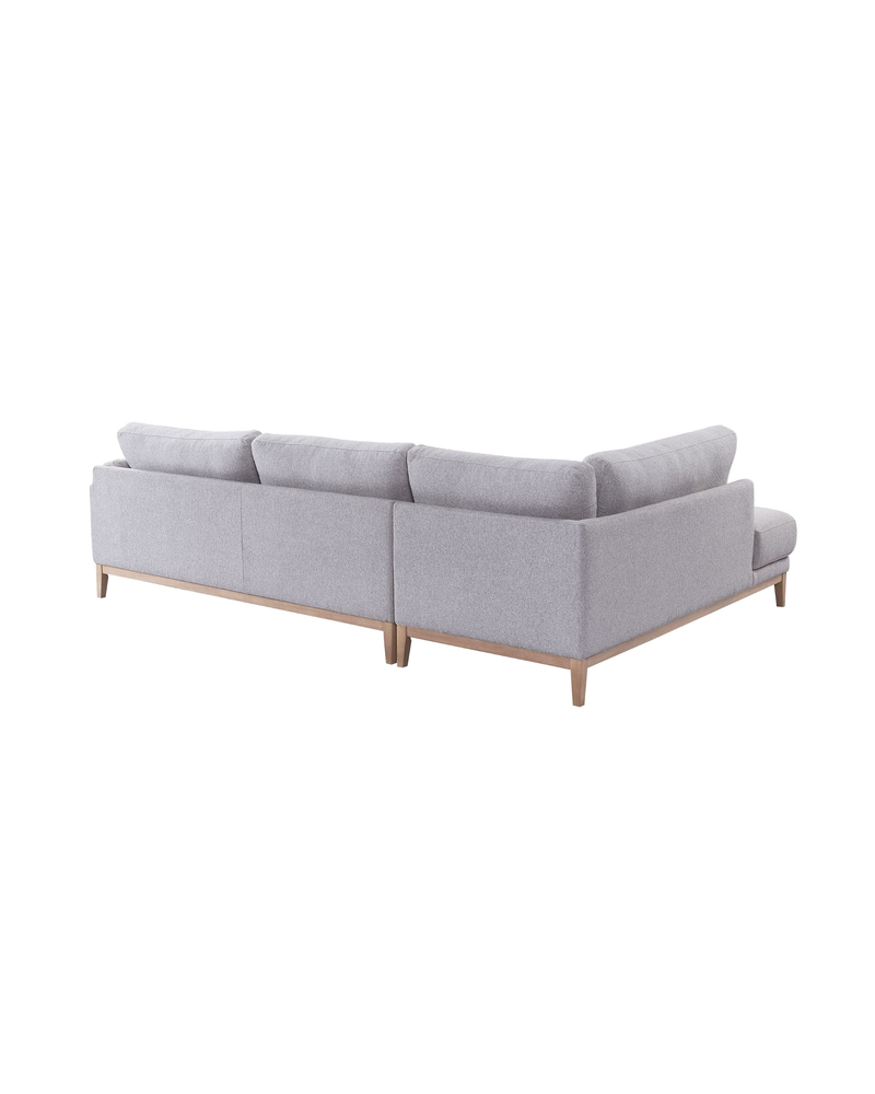 Upholstered Liva Sectional in Truffle Grey, left facing, back view showing the finished reverse