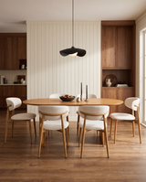 Mabel Dining Chair in Almond Cream with Oak, styled in a dining room, view 2