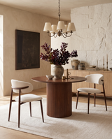 Mabel Dining Chair in Almond Cream with Walnut, styled in a dining room, view 2