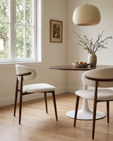 Mabel Dining Chair in Almond Cream with Walnut, styled in a dining room