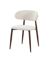 Bouclé Mabel Dining Chair with Walnut-finish metal legs, three-quarter view showing seat depth