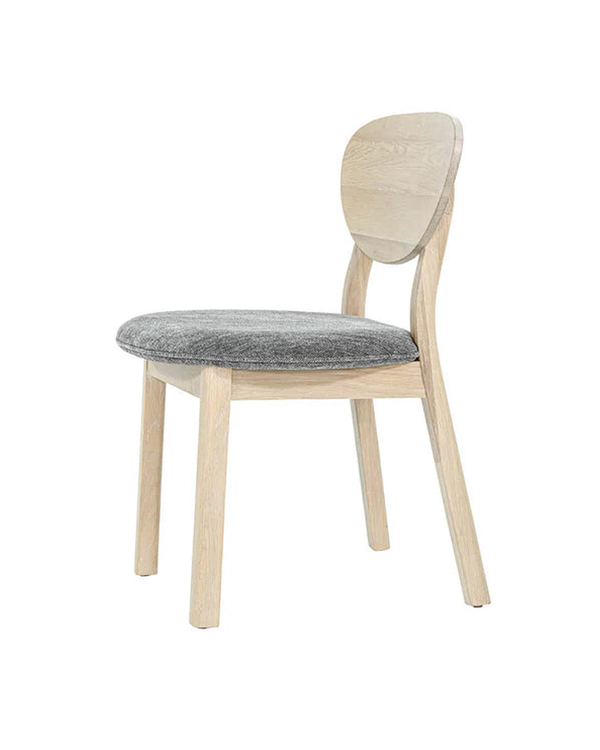 Upholstered Maeve Dining Chair, side profile showing the contoured oak back