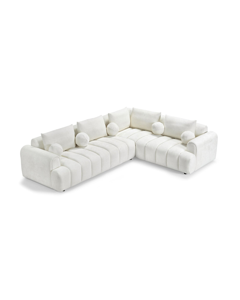 Bouclé Mellow Sectional in Cream Puff, right facing, three-quarter view showing the corner