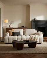 Mellow Sofa in Cashew Cream, styled in a living room, view 2