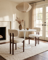 Mirae Dining Chair in Almond Cream with Walnut, styled in a dining room
