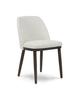 Raya Dining Chair in Cashmere Cream, three-quarter view with curved back