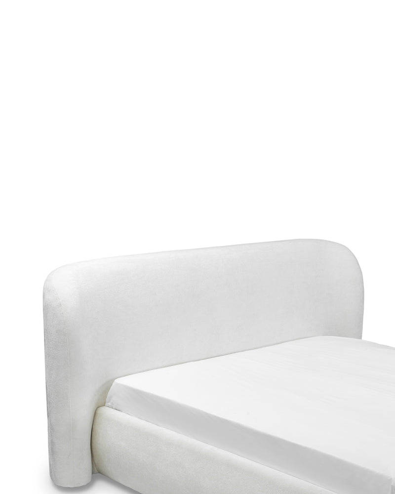 Aykah upholstered Retreat Bed in Chantilly, close-up of the seam and stitching