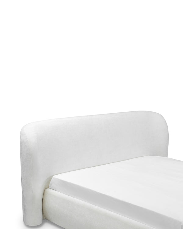 Aykah upholstered Retreat Bed in Cream Puff, close-up of the seam and stitching