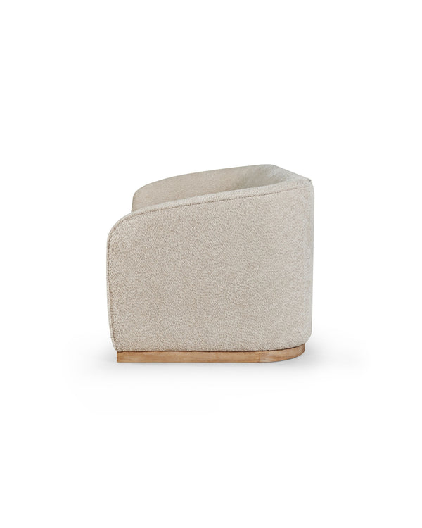 Sorelle Sofa in Almond Biscotti, side profile showing the curved, wraparound back
