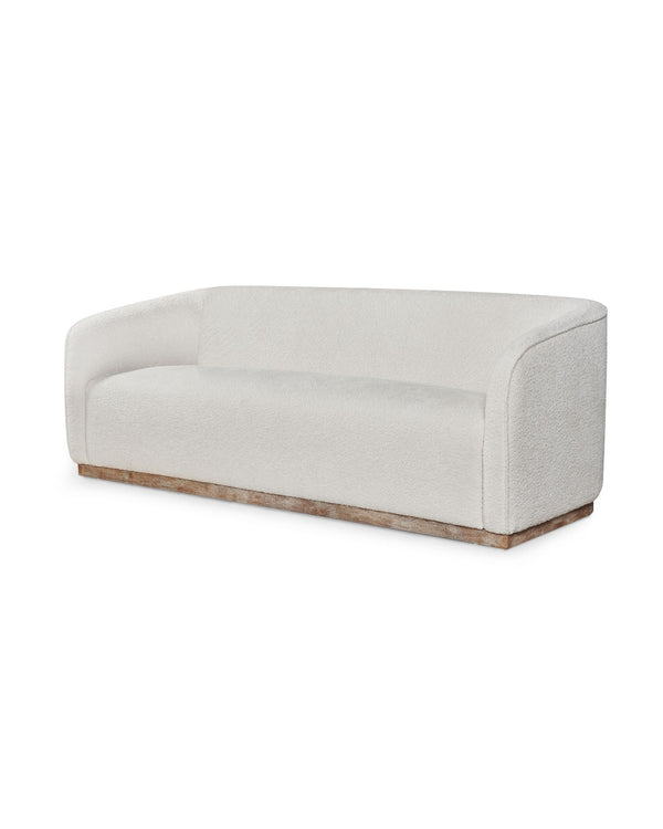 Sorelle Sofa, three-quarter view with curved, wraparound back