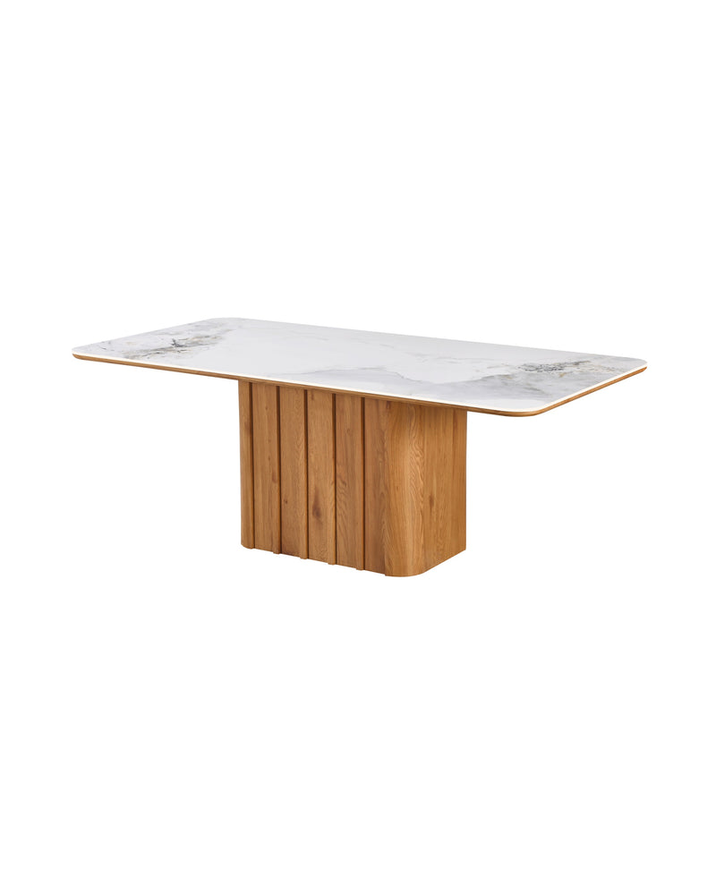 Aykah Sylas Dining Table in Honey Oak, three-quarter view showing the fluted base