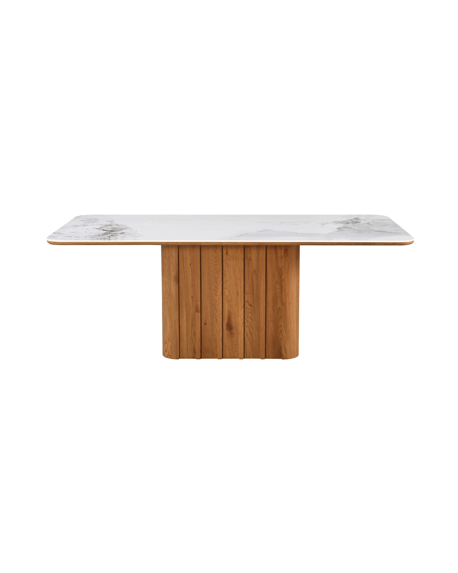 Aykah marble-look Sylas Dining Table in Honey Oak, front view with fluted pedestal base