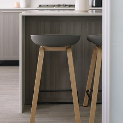 Metal Willow Grey Counter Stool at a kitchen counter