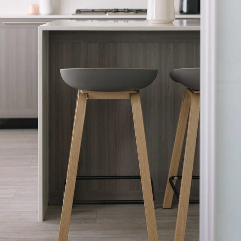 Metal Willow Grey Counter Stool at a kitchen counter