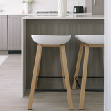 Metal Willow White Counter Stool at a kitchen counter