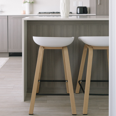 Metal Willow White Counter Stool at a kitchen counter