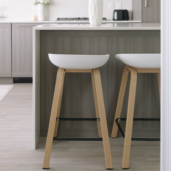 Metal Willow White Counter Stool at a kitchen counter